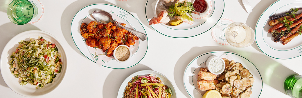 plates of food on a white table